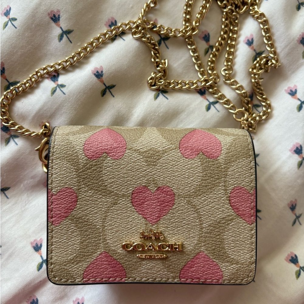 Coach heart wallet on a chain